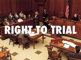 Picture of courtroom with words 'right to trial' on it.