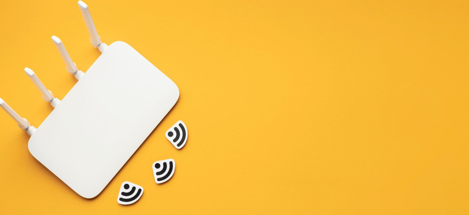 A modern white wireless router with multiple antennas, symbolizing strong signal strength, on a vibrant yellow background.