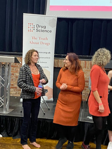 Jane Hinchliffe and Julie Durrans stood in front of a Drug Science sign