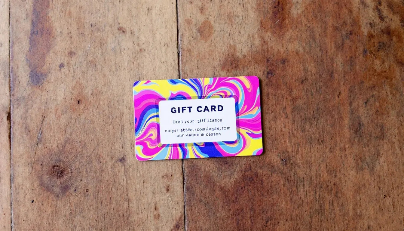 A colorful gift card placed on a wooden table.
