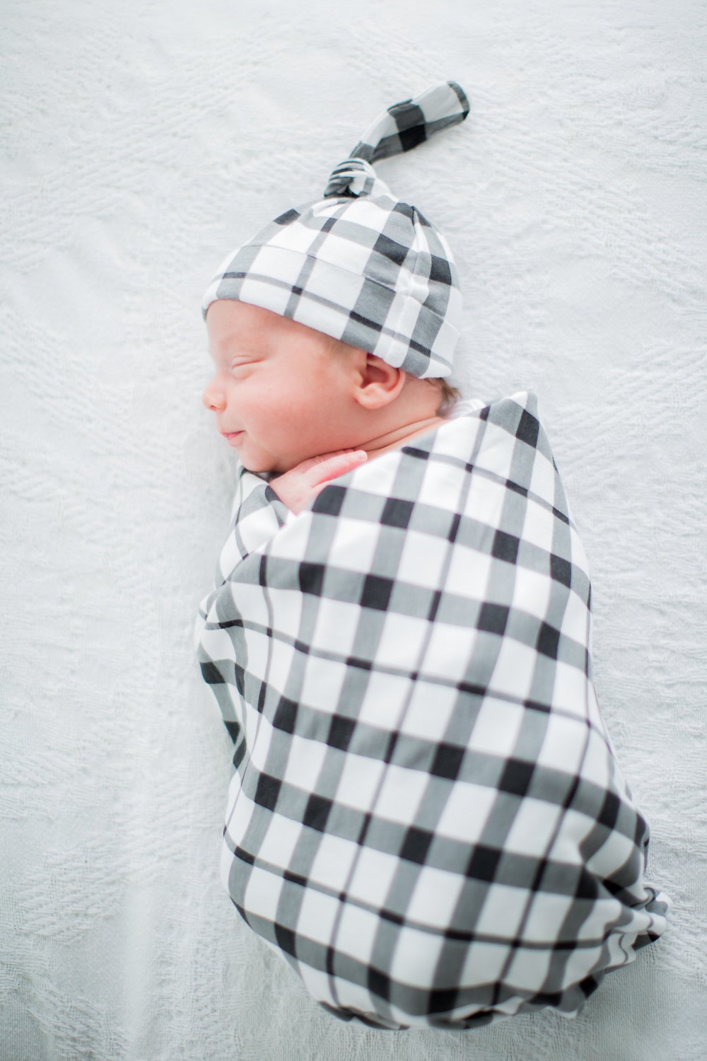 newborn hat and swaddle