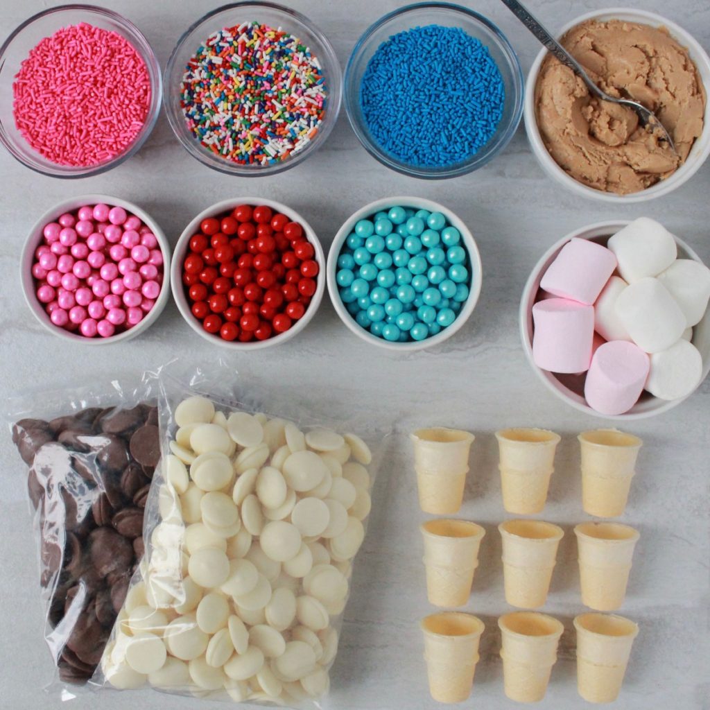 Supplies for making peanut butter surprise inside ice cream cones candies