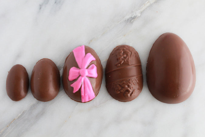 homemade peanut butter eggs in different sizes