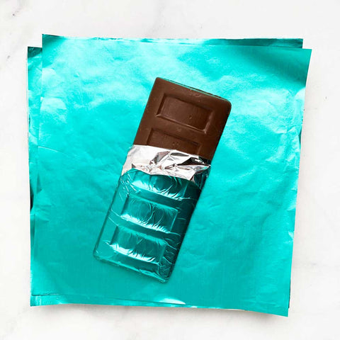 https://cdn.shopify.com/s/files/1/0717/6529/5391/products/6x6-inch-teal-candy-foil-wrappers.jpg?v=1684453393&width=480