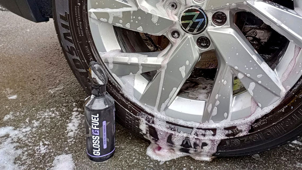 Gloss Fuel Iron Fallout Remover decontaminating an alloy wheel.