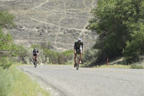 Jesse Thomas on bike at Wildflower Triathlon