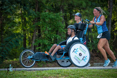 The Kyle Pease Foundation volunteers racing with assisted athletes