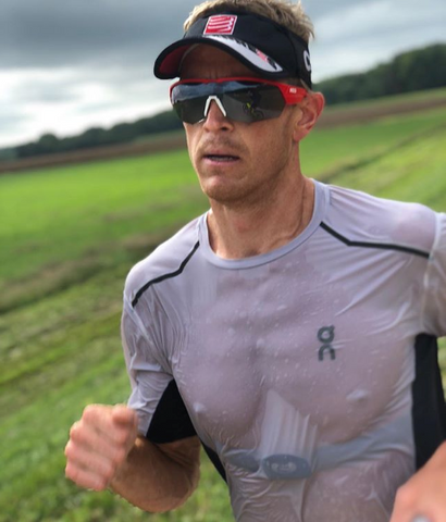 Pro triathlete Matt Hanson running with heart rate monitor