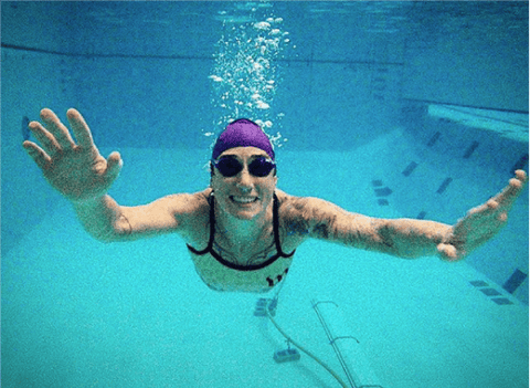 Rachel McBride swimming in pool