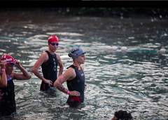 Sarah True professional triathlete at the start of an open water swim