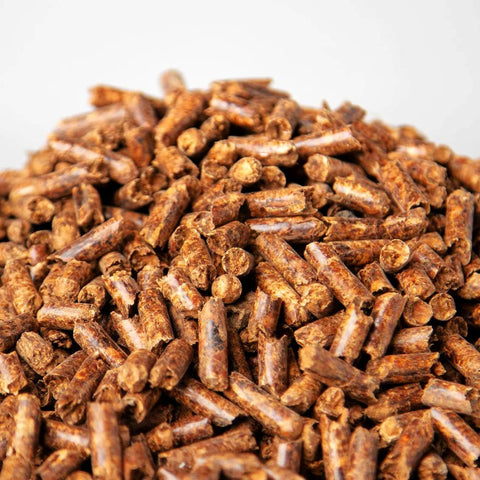Close up view of wood pellets for spit roasters and smoking