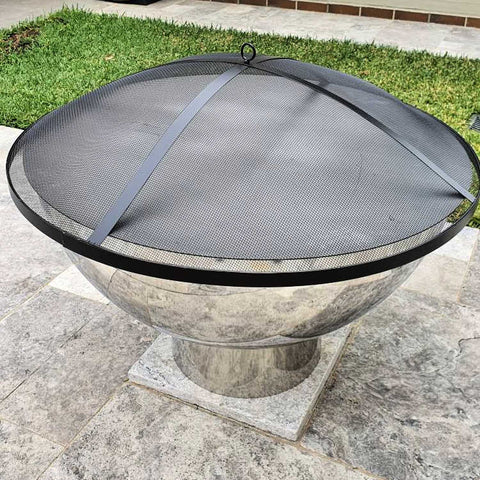 Stainless steel fire pit with a lid and ember screen by Outdoor Living Australia