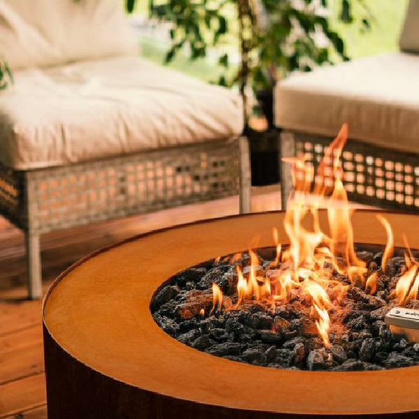 Fireplace | Planika Galio Star with Remote close up in an outdoor setting