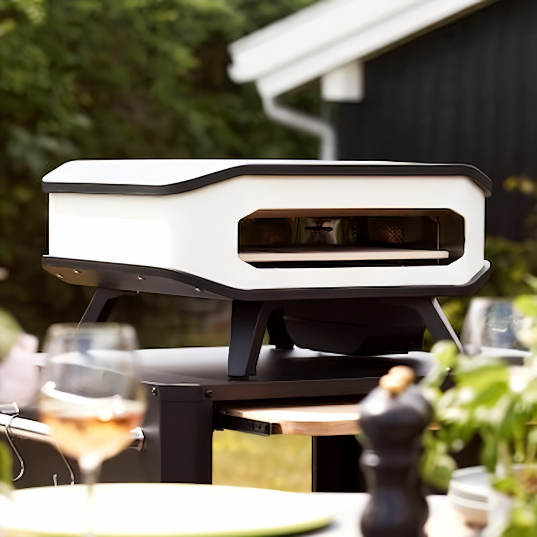 Electric Pizza Oven | Cozze White 13 Inch in outdoor area sitting on table