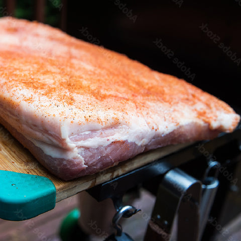 Prepped Pork Belly with rub on it ready to go into smoker