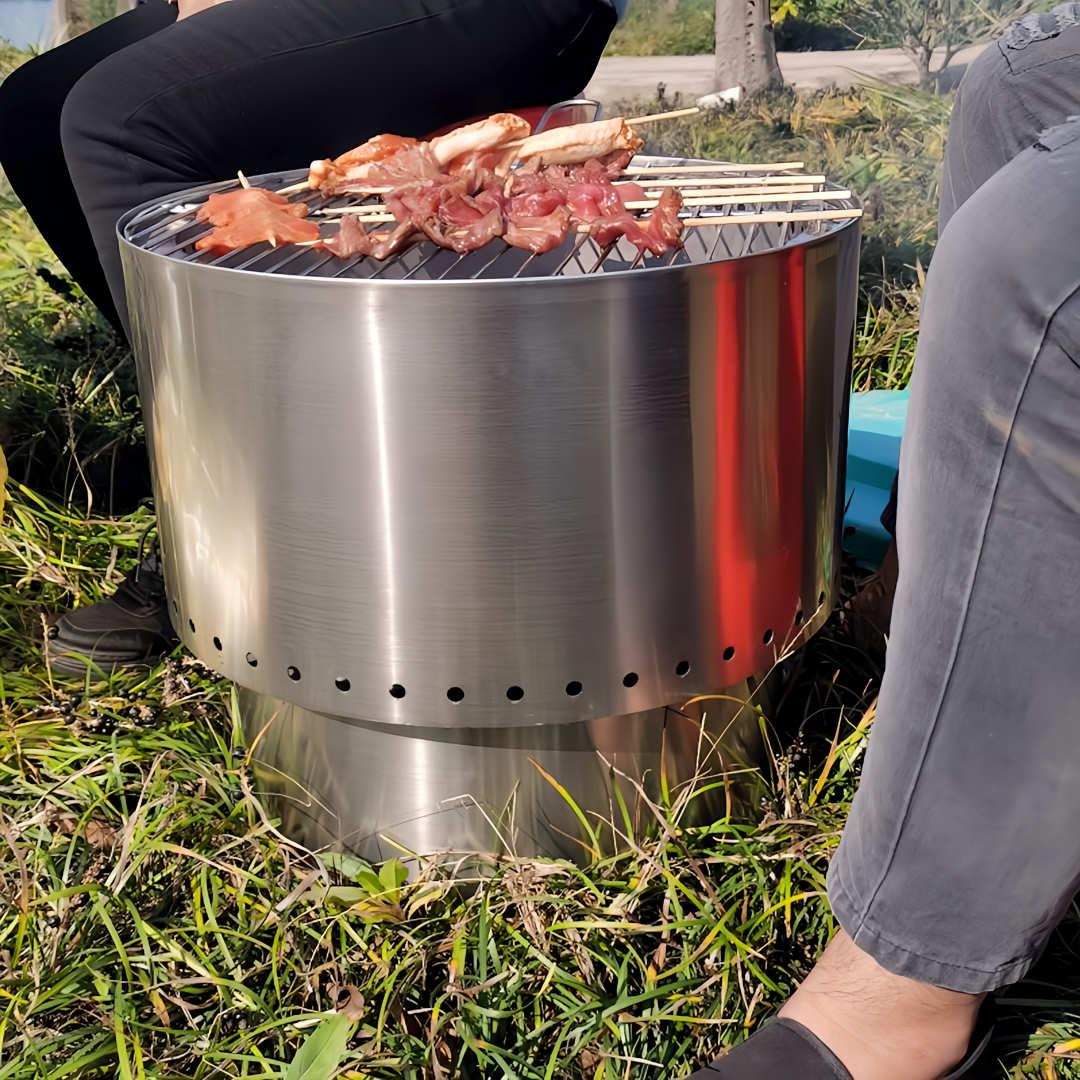 Smokeless Fire Pit outdoors with meat on cooking grill