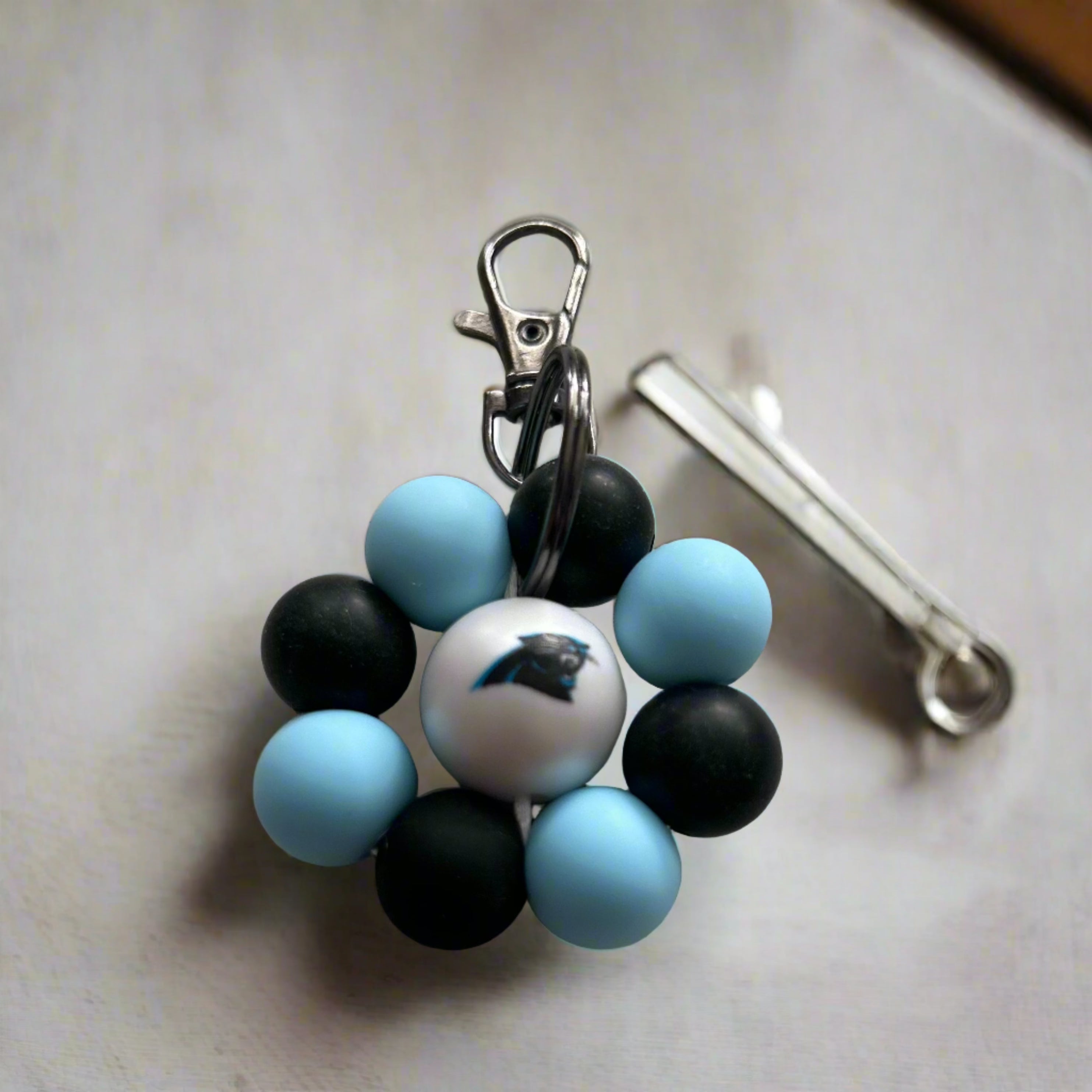 Blue and black sports flower keychain