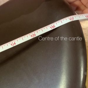 Measuring Saddle Seat Size to the middle of the cantle.
