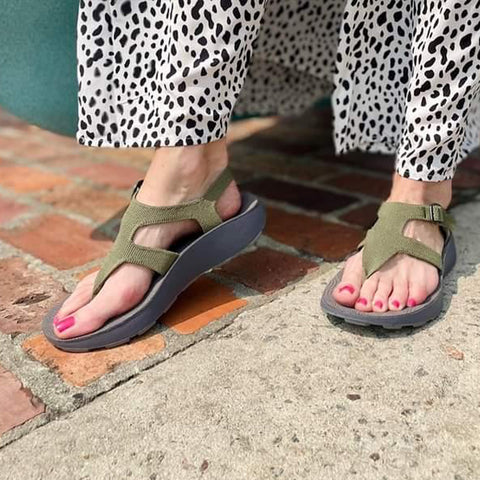 Women's Albion Sandals in Leaf paired with a bold Dalmatian print dress