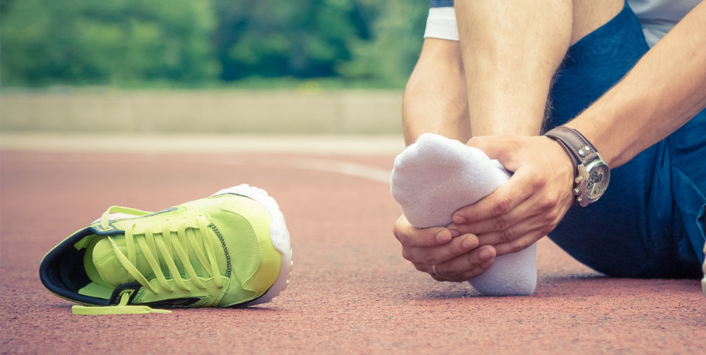 Tennis shoe laying on track