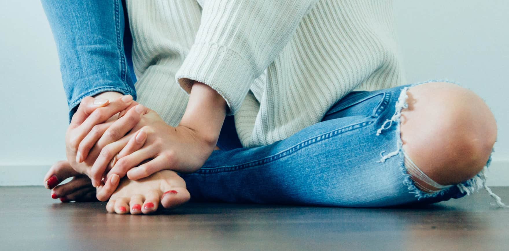 Stretching feet on floor