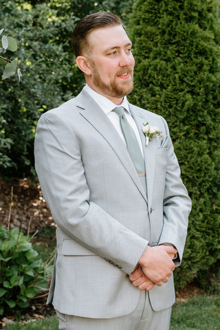 Summer wedding at the Herb Lyceum in Groton - groom waiting for bride at altar