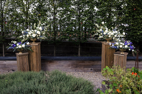 Elegant coastal blue ceremony flower arrangements at Strangers and Saints, Provincetown, Cape Cod Wedding