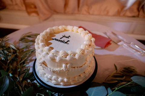 Image of small wedding cake that says "Just Married".