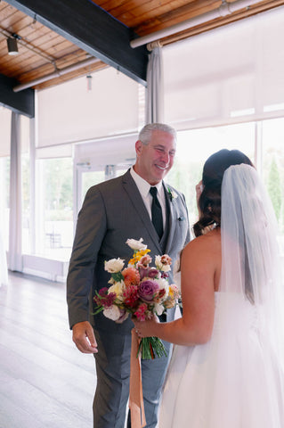 Image of first look between bride and father of the bride.