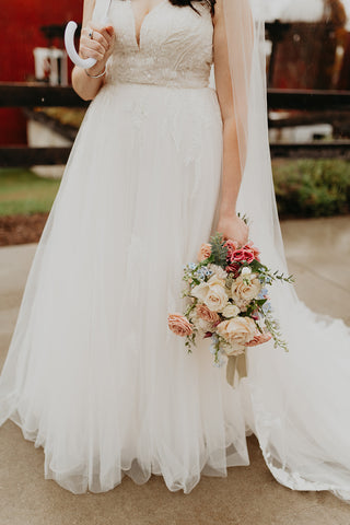 close up of bridal bouquet at a rustic wedding