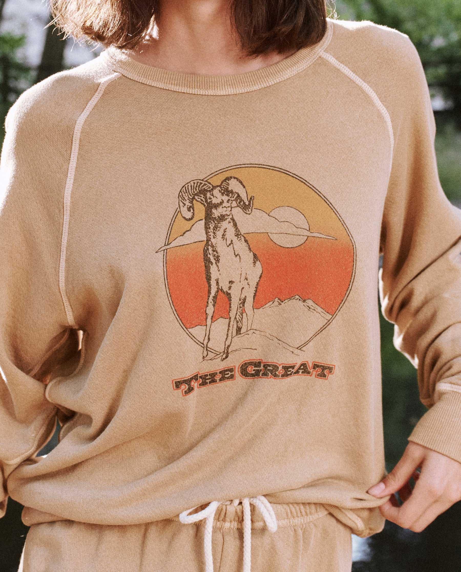 The College Sweatshirt. Graphic -- Oat with Ram Graphic