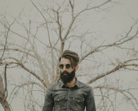 full bearded man in woods 