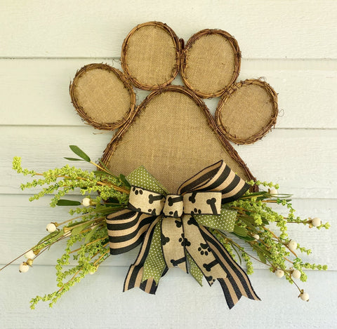 Burlap and Grapevine Dog Paw Hanger with Beige and Black Bow and Greenery