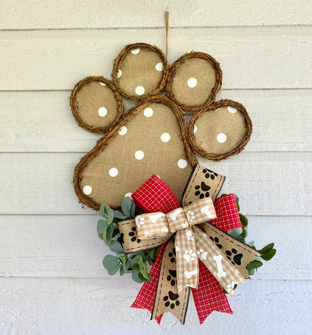 Vine and Burlap Polka Dot Dog Paw Door Hanger with red and beige dog themed bow with greenery.