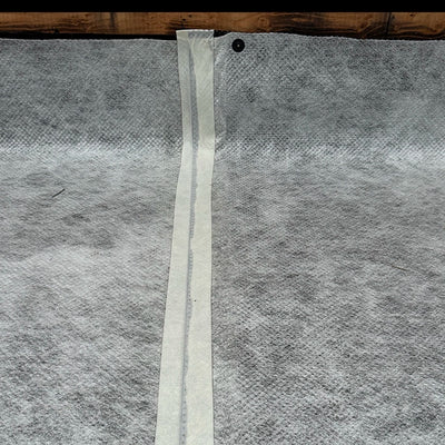 Taping the seams of SUPERSEAL Double Drain 