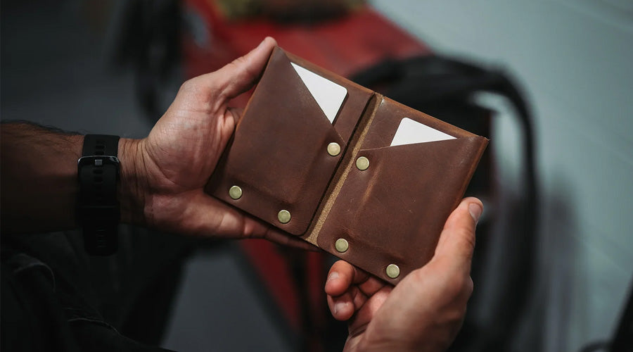 hands holding Bill-Fold Wallet