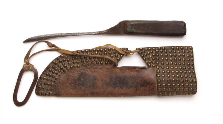 leather knife sheath decorated with brass buttons