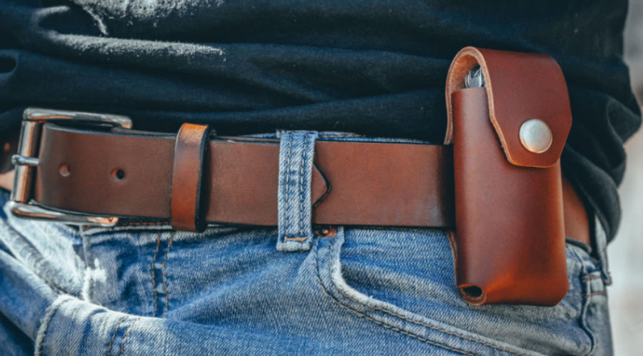 multi-tool leather sheath on a belt