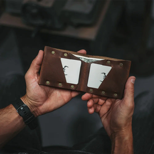 hands holding Frontier Wallet