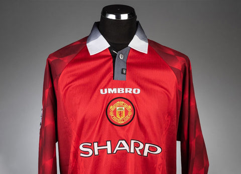 Manchester United 1997 Home Jersey displaying rounded crest patch.