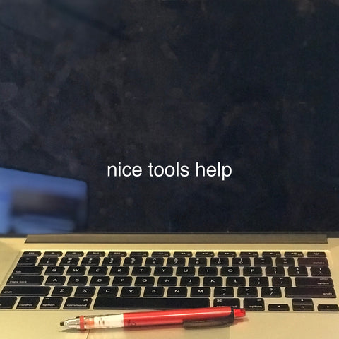Kuru Toga mechanical pencil and MacBook