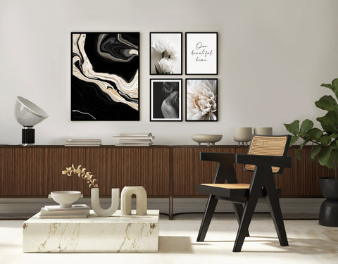 black and white graphic art gallery wall in neutral and wooden living room. 