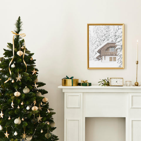 Snowy Cabin festive wall art print in festive setting.