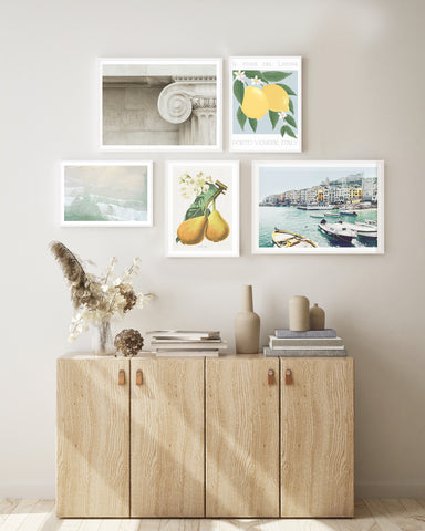 Fresh Italian summer gallery wall with lemon and pears and seaside prints. 