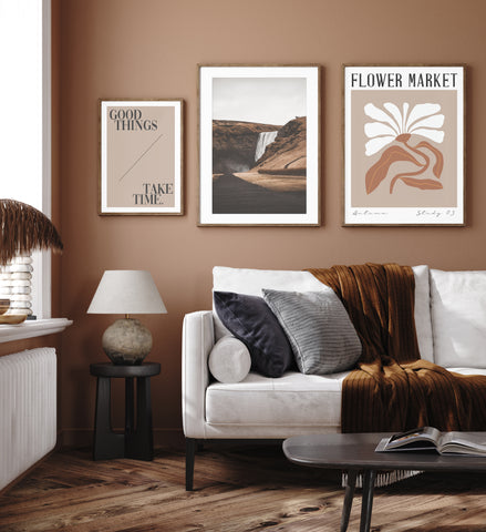 gallery wall with mountain landscape and waterfall photography wall art. 