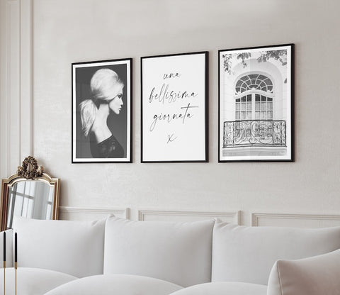 black and white gallery wall including typography in a neutral living room. 