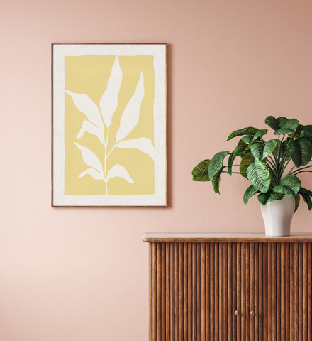 Yellow botanic abstract wall art pictured in a pink entrance hallway. 