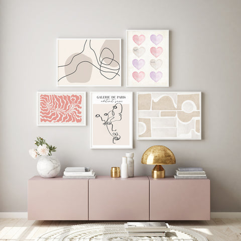Neutral and pink abstract gallery wall. 