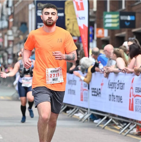 Animal Instinct co-founder Nile Breeze running the Chester Half Marathon in an AI Mens Athletic Performance Top