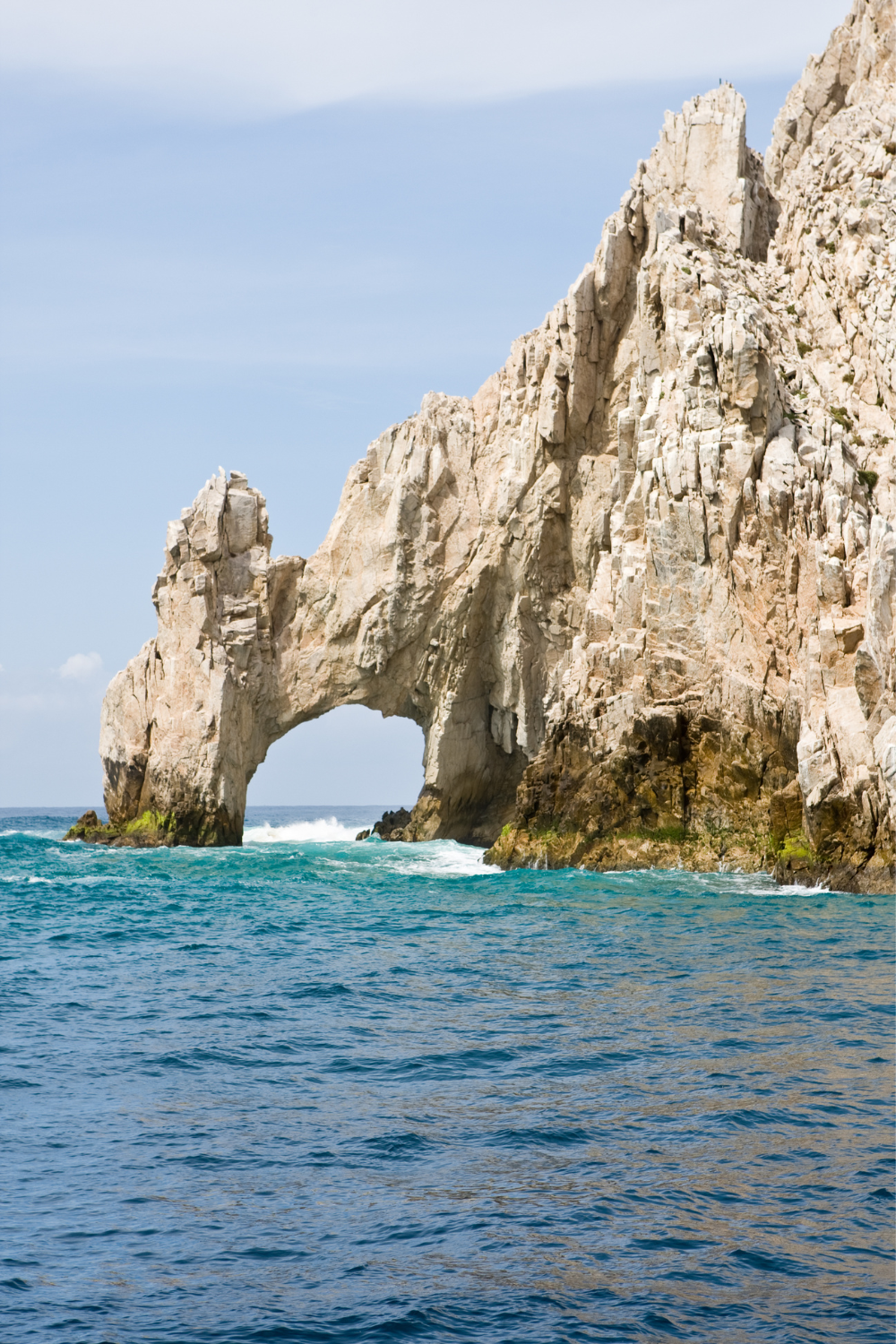 Famous arch in Cabo San Lucas in day time light 